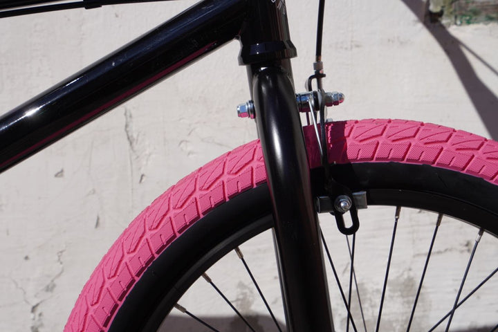 Blueprint 20" TT in gloss black with pink tires BMX